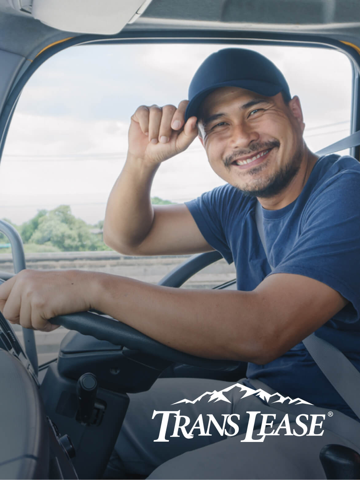 Man driving truck with Trans Lease logo